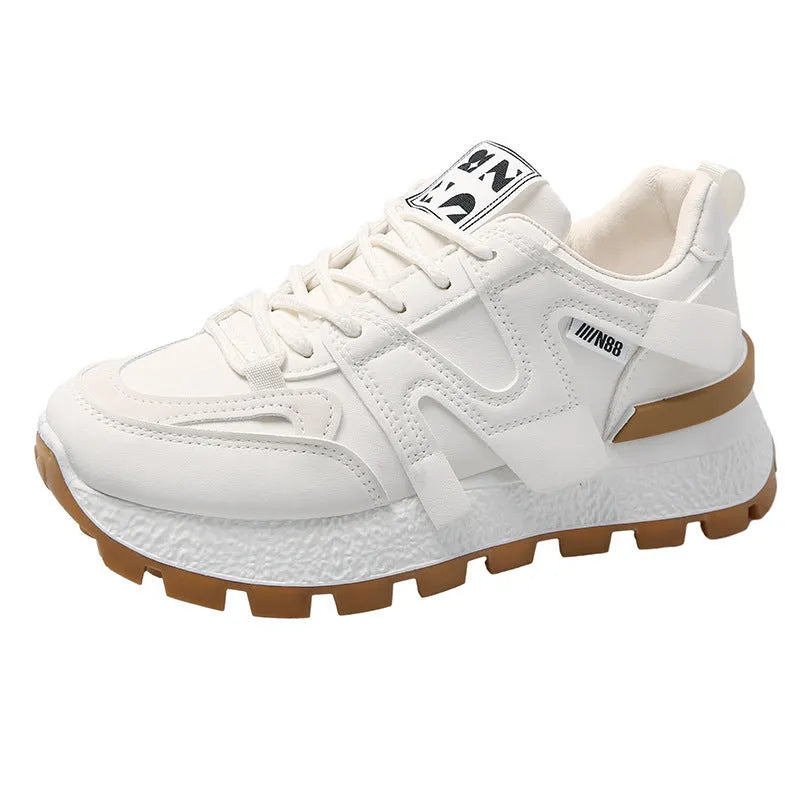 Low-top casual sneaker with artificial PU upper and rubber sole in black or white colour