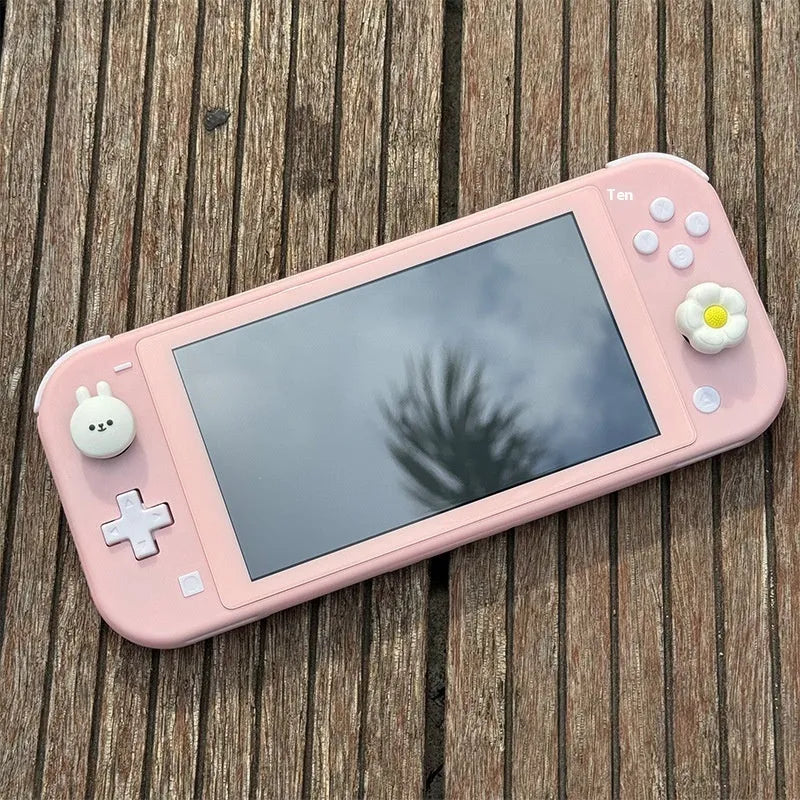 DIY transparent Switch Lite shell kit with ABS PC material, tempered film, and button set on a neutral background