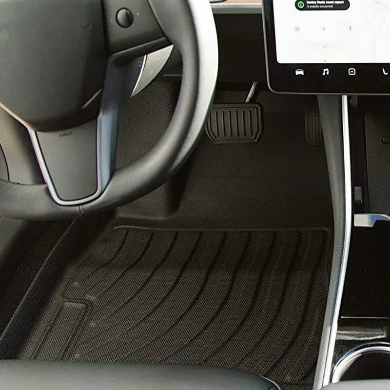 Rubber floor mats with TPE footrest designed for Tesla Model 3, Model Y, Model X, and Model S cars