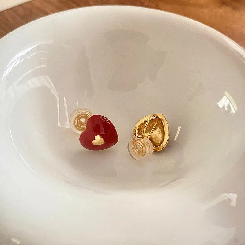 Vintage red heart-shaped copper earrings with oil dripping finish and 925 silver needle post