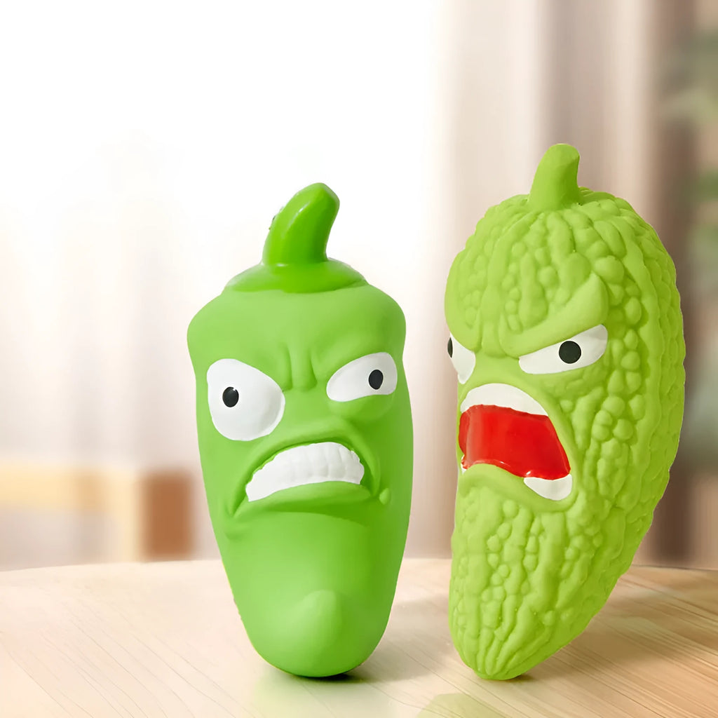 Bitter melon or chilli shaped dog chew toy with textured surface for teeth cleaning and integrated sound element