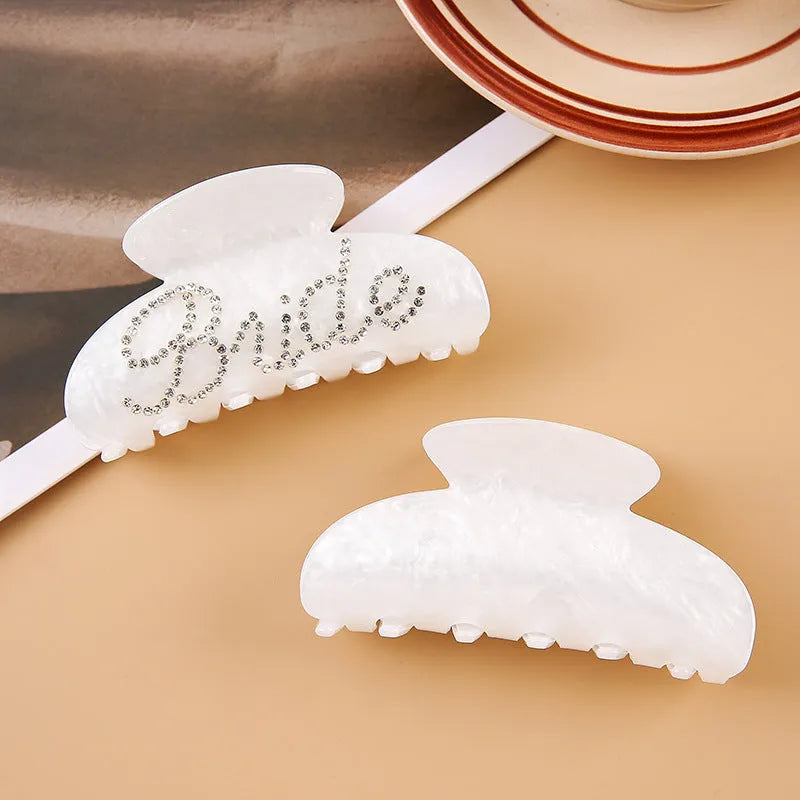 Pink and white acrylic hair clip with spot drill pattern and double-sided decoration