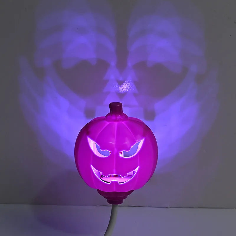 Plastic pumpkin-shaped decorative lamp with USB charging port, shown with purple or yellow light option.