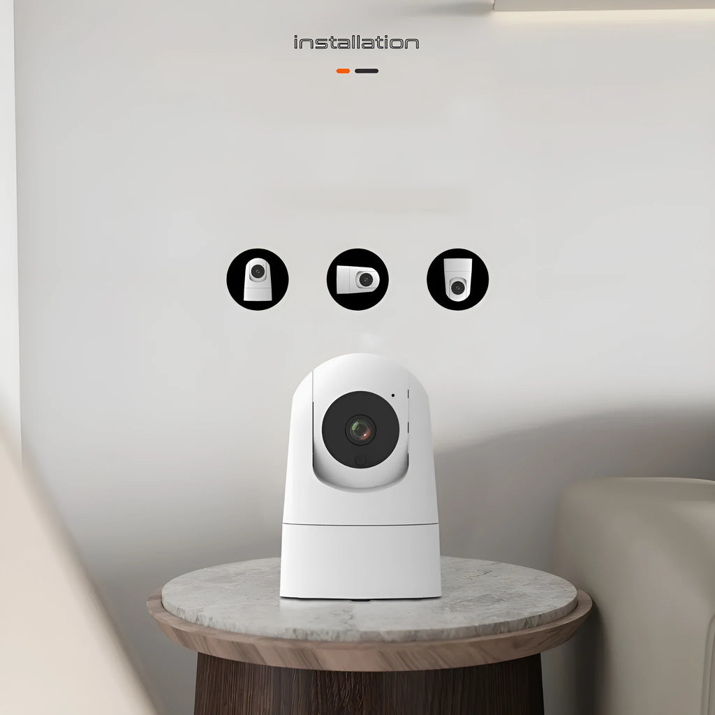 White indoor smart security camera on a table with UK power plug