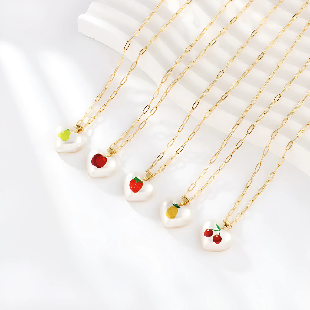 Geometric fruit pendant necklace with adjustable chain showing Apple, Cherry, Pear, Pineapple and Strawberry colour variations