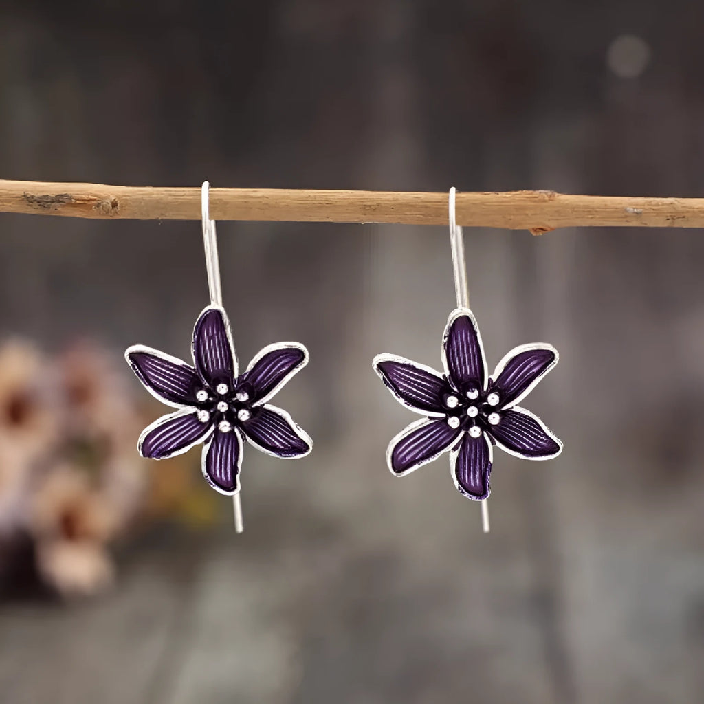 Purple flower-shaped earrings with electroplated finish and alloy construction