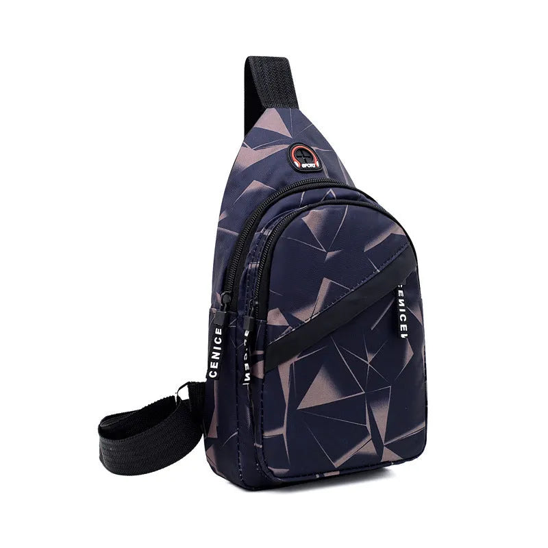 Men's blue print sling chest bag with earphone hole, shown worn crossbody.