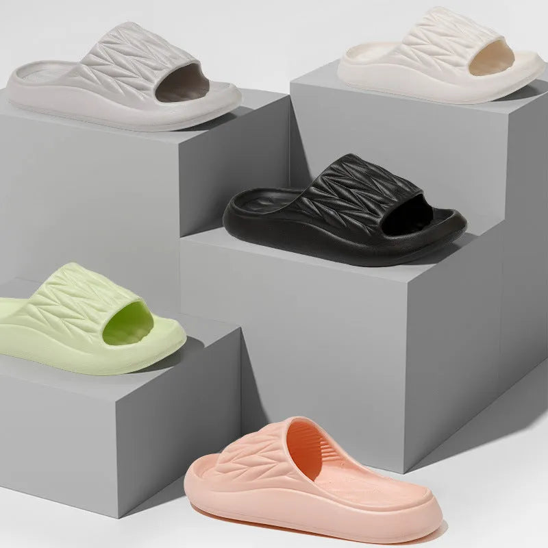 Leaf texture patterned EVA foam slippers for indoor household use, shown in multiple colours.