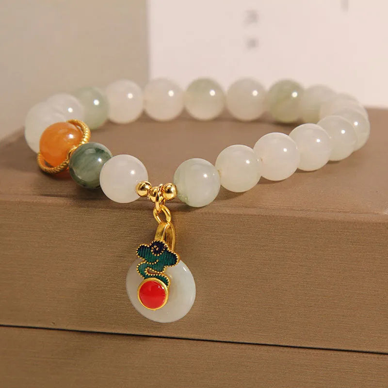 Women's adjustable ice jade bracelet with pearl accents and xiangyun jade buckle