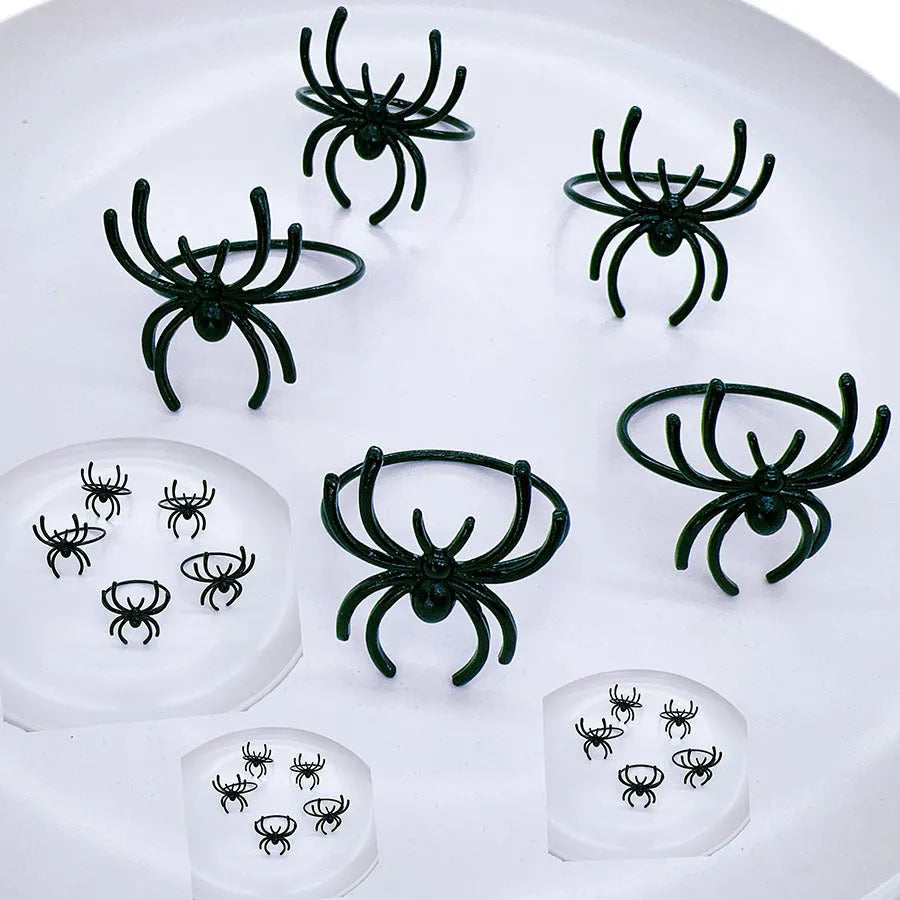 Six black spider Halloween napkin rings made from alloy metal with electrophoresis finish