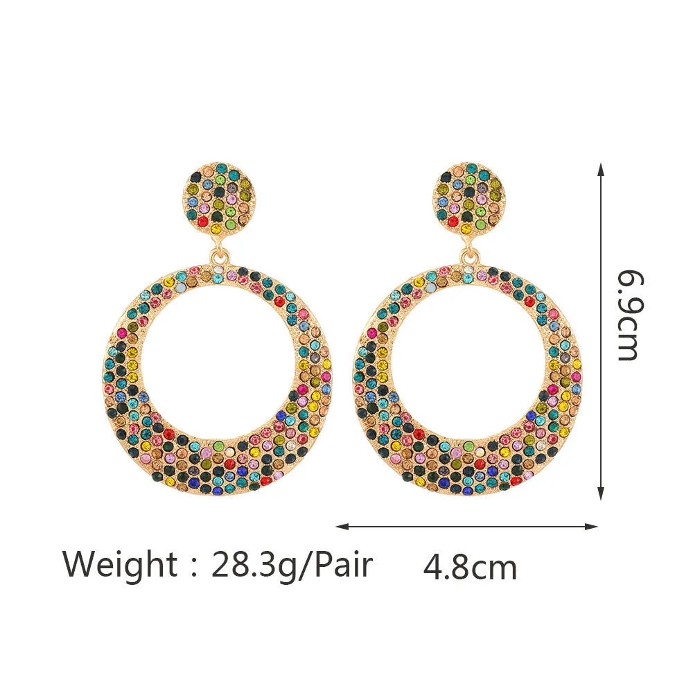 Cartoon-style metal alloy earrings with large diamond pendant drop in various colour options