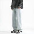 Men's washed straight leg jeans in 882 light blue with button waist closure and straight leg cut