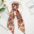 Large intestine ring hair tie with long ribbon in various colours including floral patterns