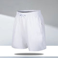 Men's quick-dry polyester beach shorts in loose fit with micro-elastic construction