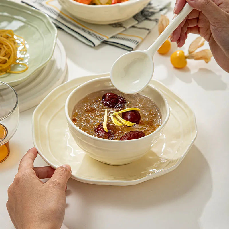 Solid colour ceramic tableware set with seven pieces showing modern simple design