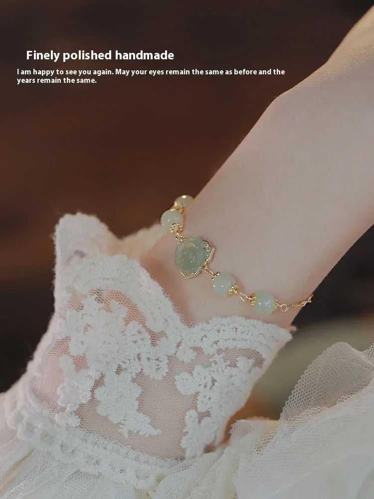 Women's floral bracelet in Hetian Jade Rose with 14K gold gilding and manual craftsmanship.