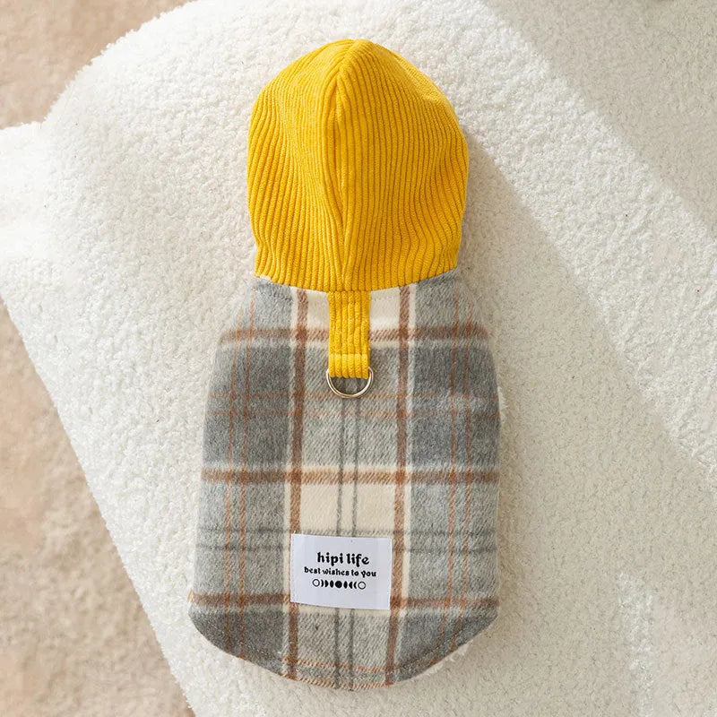 Blue corduroy chessboard grid hooded vest for dog on model showing hooded traction design
