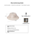 Beige wine bottle-shaped camping lantern with USB-C charging port and LED light