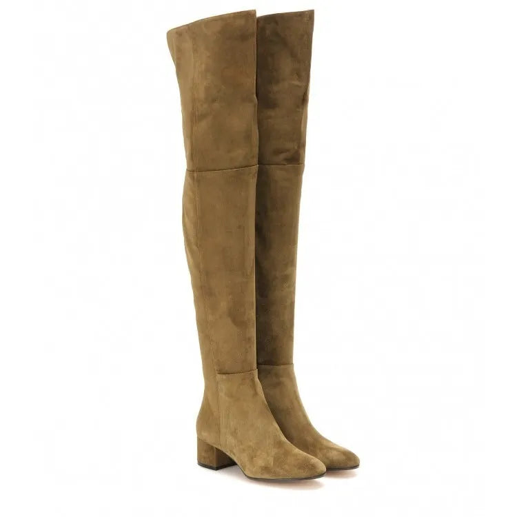 Grey women's suede flat over-the-knee boots with a pointed toe and low thick heel on a neutral background.