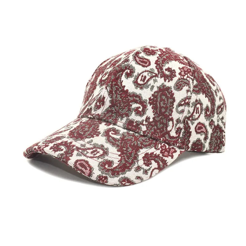 Polyester baseball cap with paisley pattern in blue colour showing dome crown design