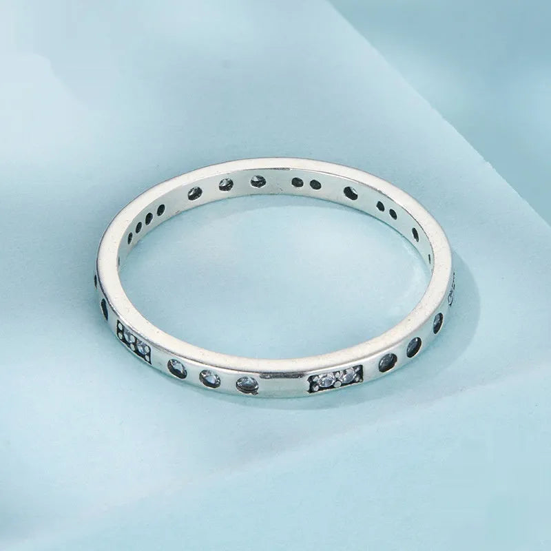 Oxidised black silver ring with Moss Password I Love You design on a simple band.