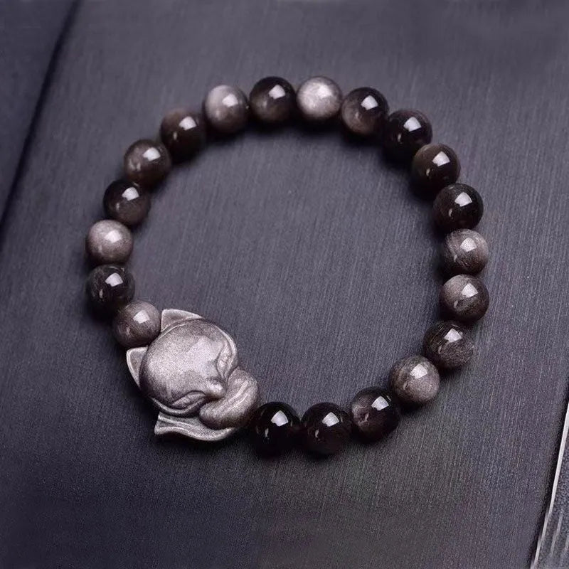 Obsidian fox single ring bracelet with 8mm beads and hand-carved animal motif on elastic cord