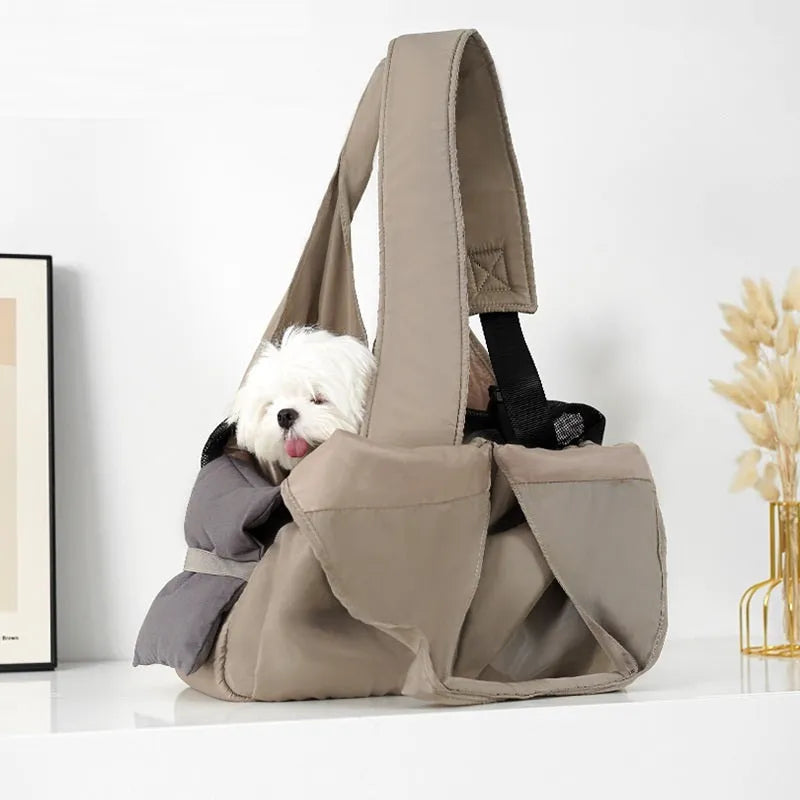 Apricot-colour cloth pet carrier handbag for small pets, showing single handle and rectangular shape.