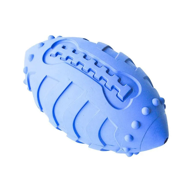 Light green rubber rugby ball dog toy with textured teeth cleaning surface
