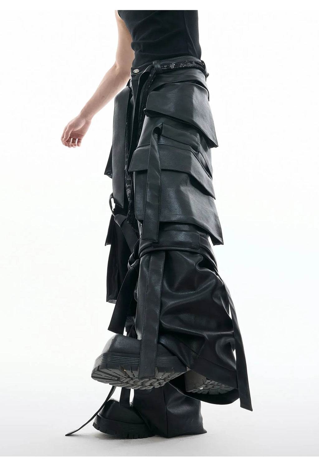 Black loose fit leather pants with multiple pockets and quilted stitching detail