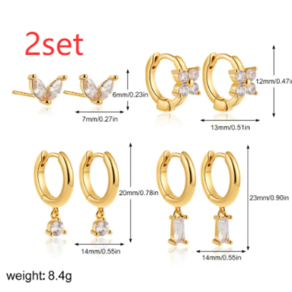 Four pairs of geometric copper earrings with zircon detailing in gold or silver electroplated finish