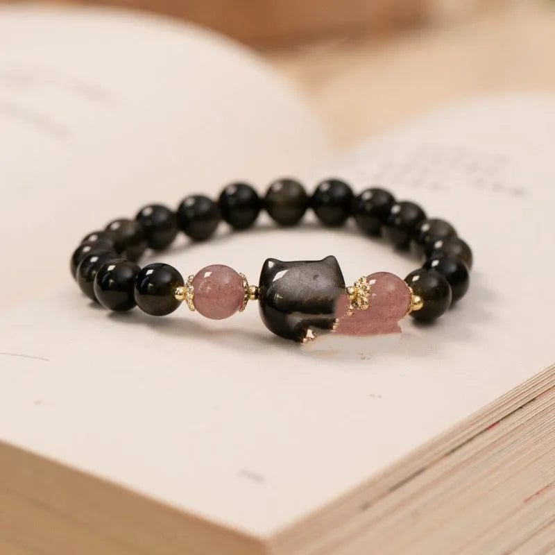Natural obsidian bracelet with 8mm black beads and kitty charm on adjustable string