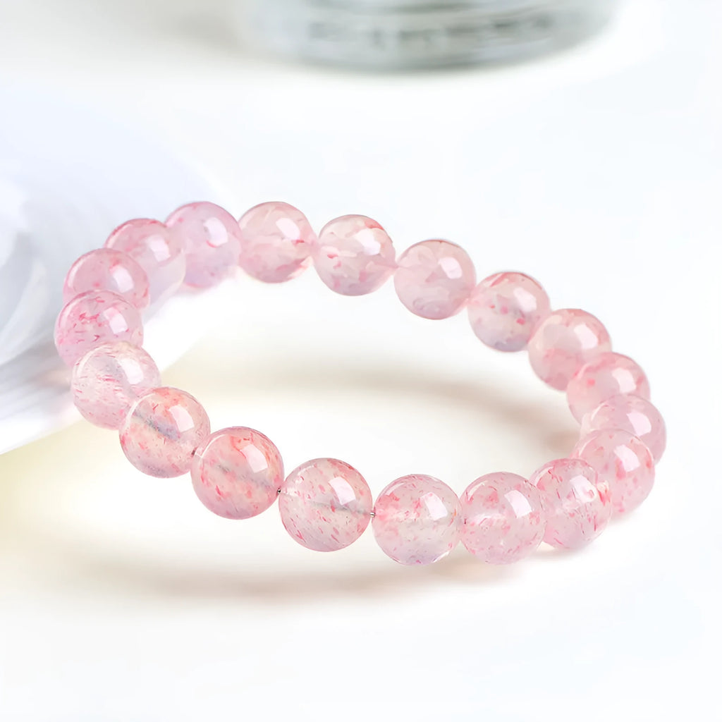Strawberry quartz crystal bracelet with 10-10.8mm natural white water gemstone beads