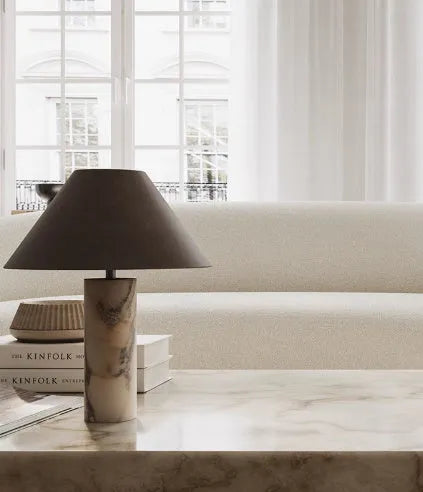 Black marble table lamp with modern design on wooden surface