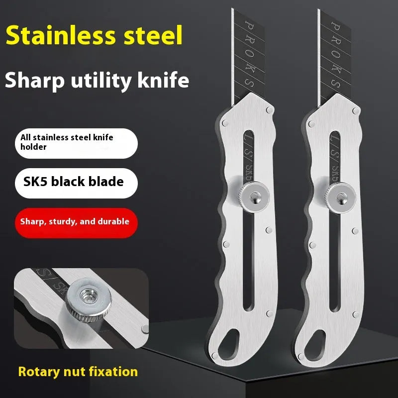 Stainless steel folding art knife with black blade alongside long and trapezoidal blades.
