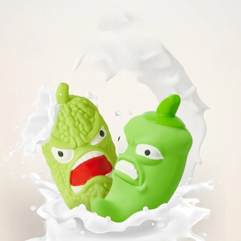 Bitter melon or chilli shaped dog chew toy with textured surface for teeth cleaning and integrated sound element