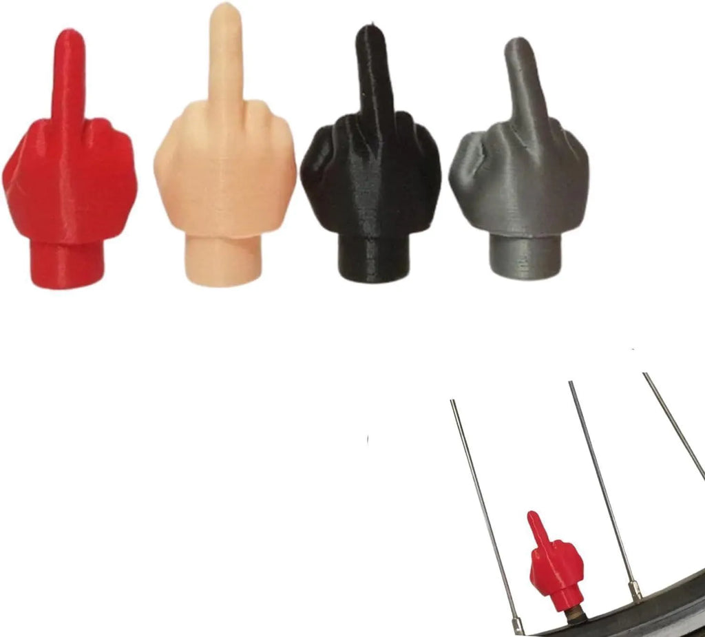 Four latex tyre valve dust caps showing black and skin colour options