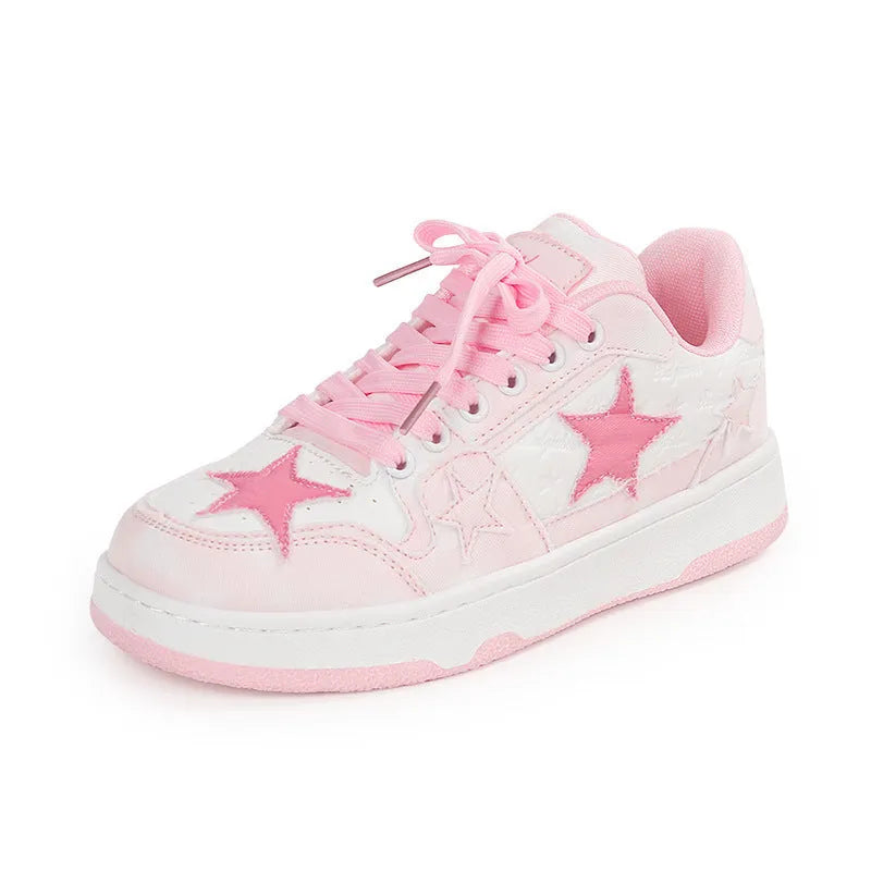 Casual denim skateboard shoes in black, green, or pink with a flat rubber sole and lace-up front.