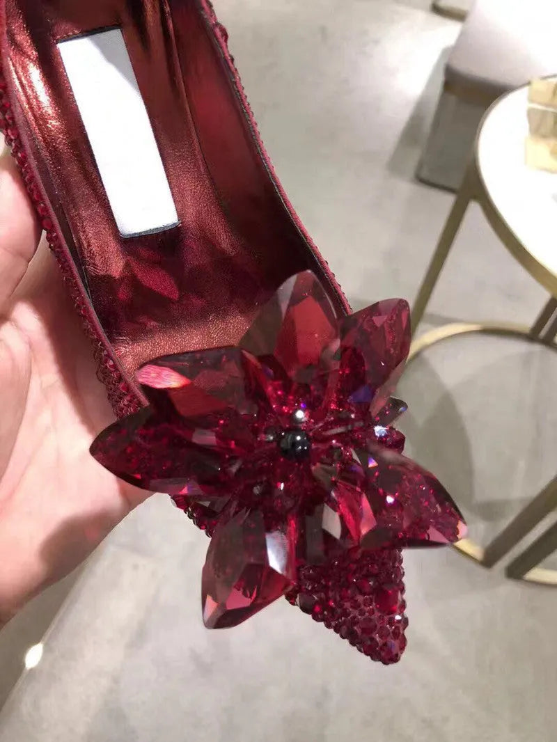 Women's gold pointed toe stiletto heels with sequin cloth upper and rhinestone decoration