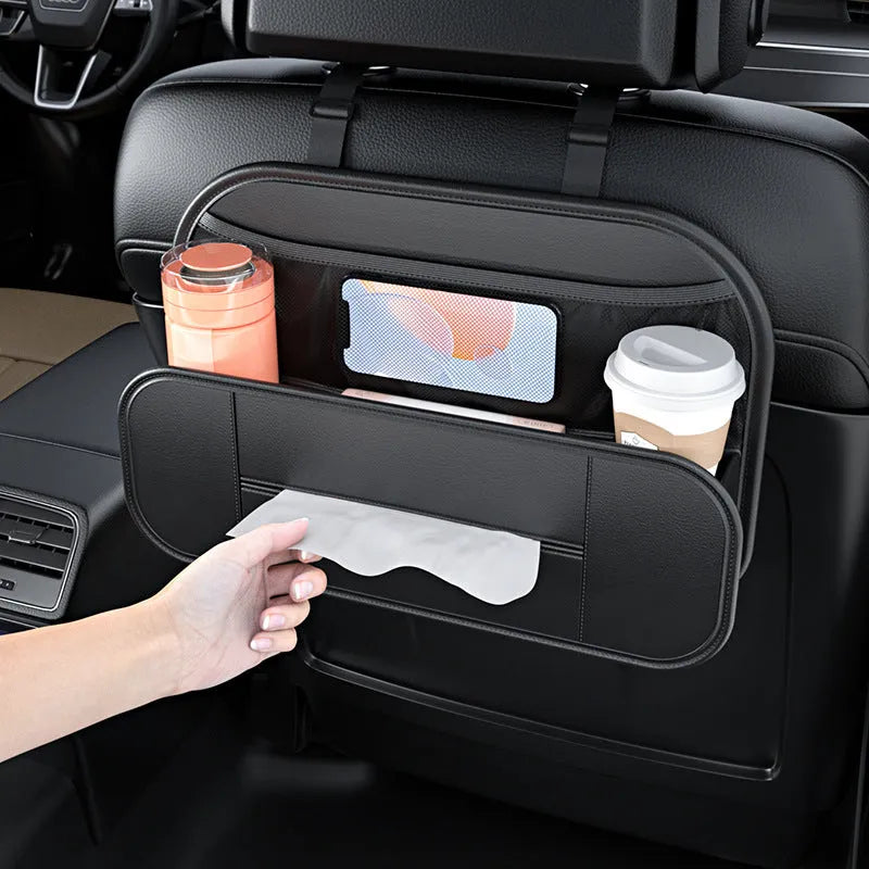 Black leather car seat rear storage bag attached to a vehicle seat, showing its storage box shape.