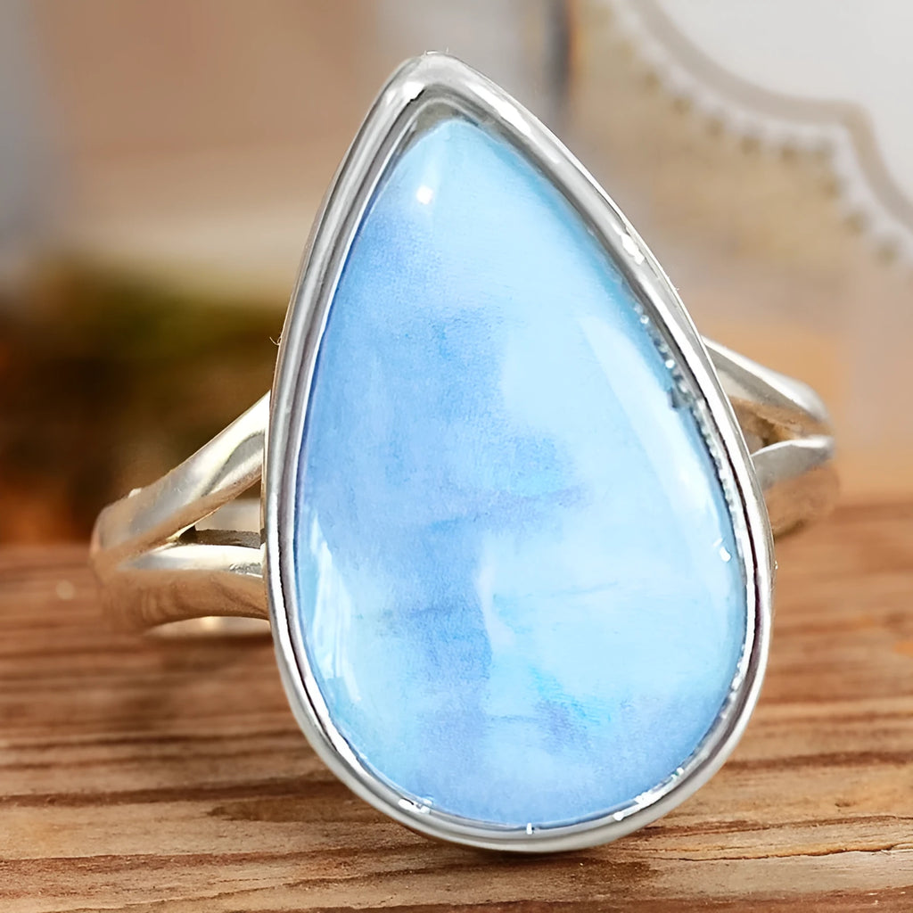 Copper ring with water drop geometric shape and white gold electroplated finish