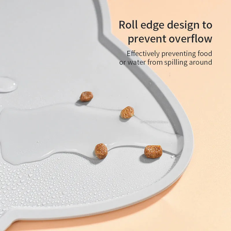 Blue silicone pet feeding mat measuring 44cm by 24cm under a dog bowl