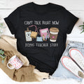 A black loose-fit cotton t-shirt with short sleeves and a crew neck, laid flat.
