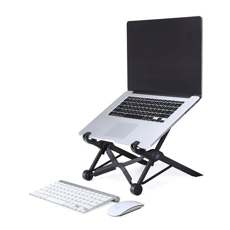 Black portable folding laptop riser on desk with 40cm wide platform