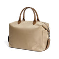 Waterproof nylon shoulder bag with leather accents in black colour showing large capacity interior