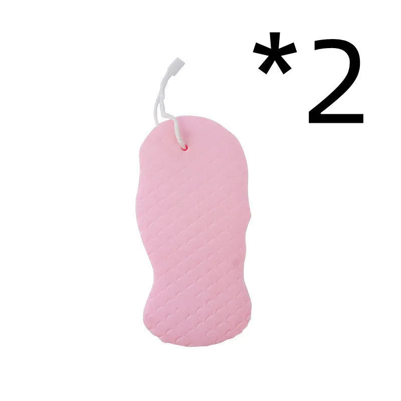 3D white bath sponge with fish scale pattern for gentle body exfoliation.