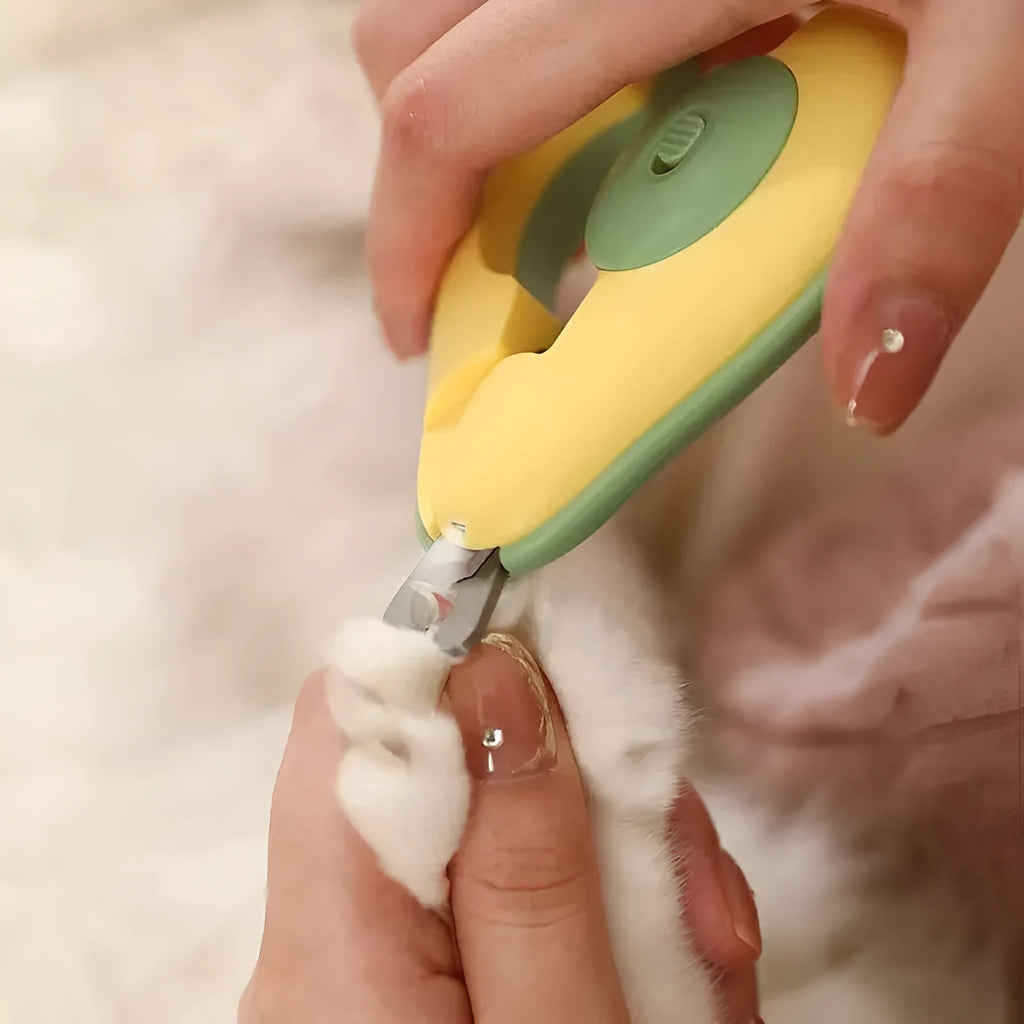 Professional LED light pet nail clipper for small dogs and cats in green, pink, or white.