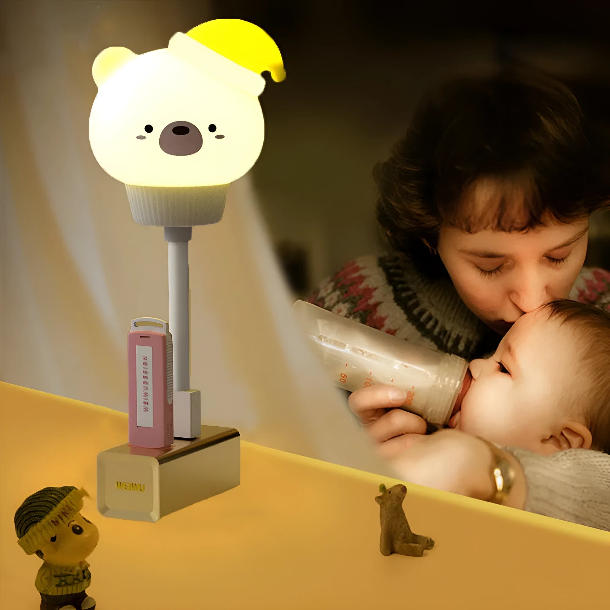 USB portable LED night light in cartoon bear shape with remote control on wooden table.
