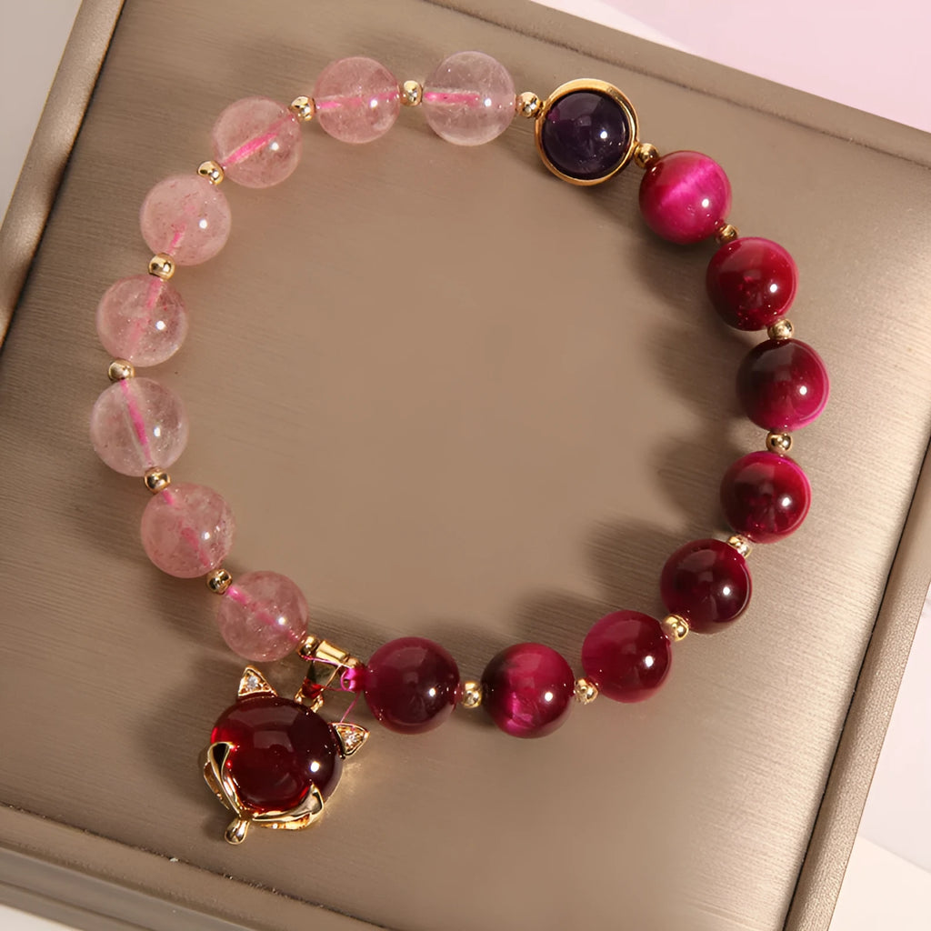 Simple strawberry crystal bracelet for women with elastic band, showing natural stone detail.