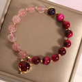 Simple strawberry crystal bracelet for women with elastic band, showing natural stone detail.