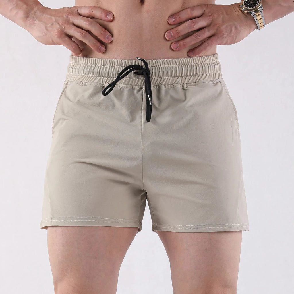 Thin polyester basketball shorts for men in grey, black, apricot and green colours with elastic waistband